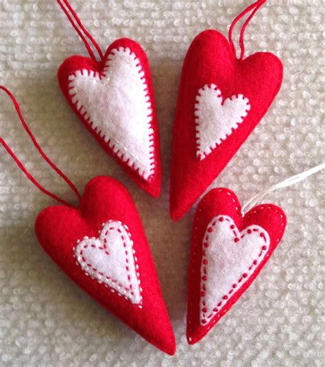 felt heart ornaments|More.